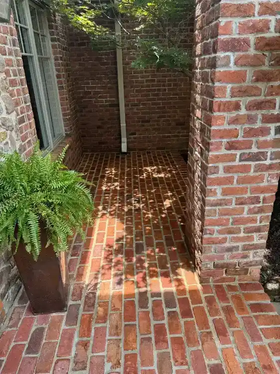 Clean brick surface after pressure washing