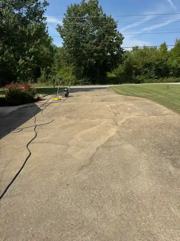 Before driveway pressure washing in Northwest Arkansas